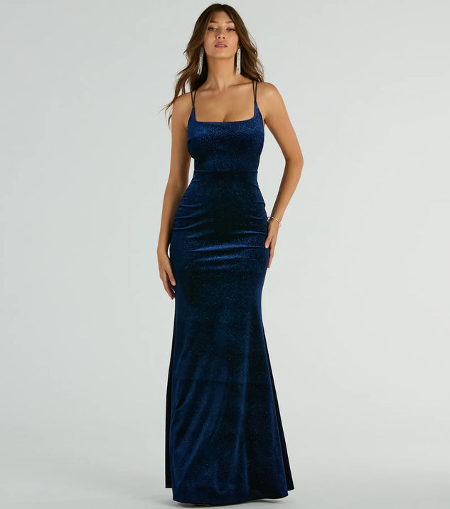 You'll be the best dressed in the Reagan Strappy Mermaid Glitter Velvet Formal Dress as your summer formal dress with unique details from Windsor.