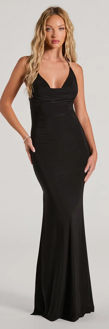 Turn heads at Prom 2025 in this black prom dress, where statement-making details meet the iconic style of the Sheila Halter Strappy Back Slit Mermaid Formal Dress .