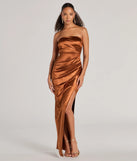 Turn heads at Prom 2025 in this mocha prom dress, where statement-making details meet the iconic style of the Lauren Strapless Wrap Slim Satin Formal Dress .