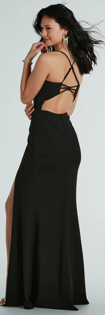 You'll be the best dressed in the Brianna Strappy Back Mermaid Crepe Formal Dress as your winter formal dress with beautiful and unique details from Windsor.