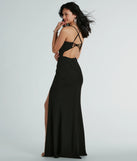 You'll be the best dressed in the Brianna Strappy Back Mermaid Crepe Formal Dress as your winter formal dress with beautiful and unique details from Windsor.