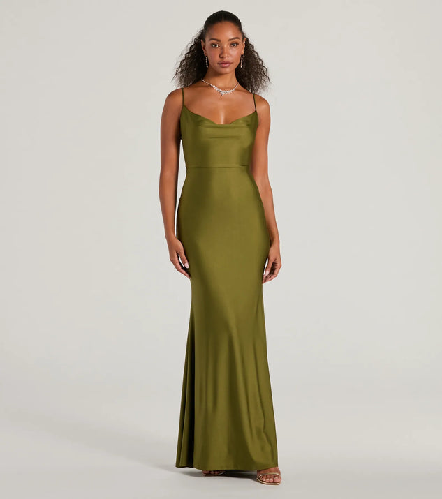 Turn heads at Prom 2025 in this olive green prom dress, where statement-making details meet the iconic style of the Virginia Cowl Neck Tie-Back Mermaid Formal Dress .