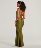 The Virginia Cowl Neck Tie-Back Mermaid Formal Dress in olive is a stunning green prom dress designed to capture attention with its fresh or bold color and effortlessly stylish silhouette.