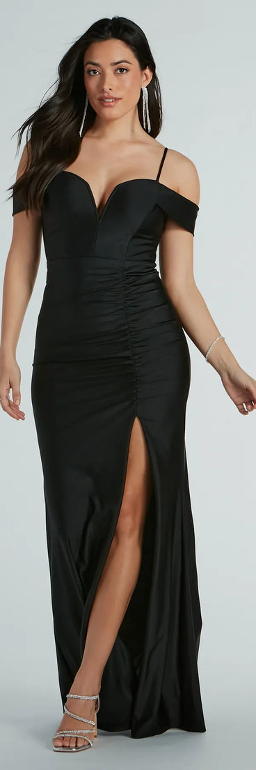 Turn heads at Prom 2025 in this black prom dress, where statement-making details meet the iconic style of the Danielle Cold-Shoulder Ruched Knit Bodycon Dress .