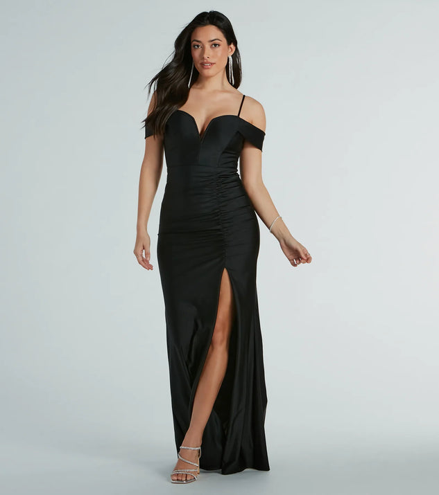 Turn heads at Prom 2025 in this black prom dress, where statement-making details meet the iconic style of the Danielle Cold-Shoulder Ruched Knit Bodycon Dress .