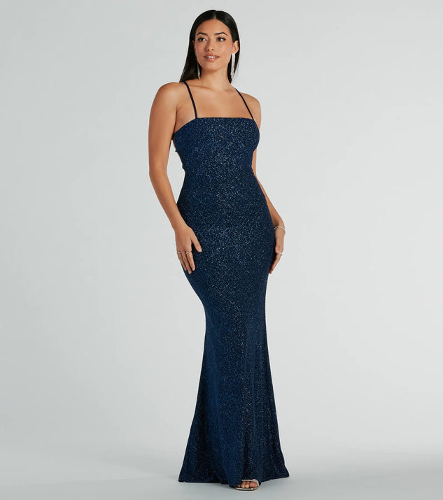 The Daisia Strappy Back Mermaid Glitter Formal Dress is a shimmery navy glitter dress that catches the light beautifully, perfect for any special outfit like Winter Formal attire, clubwear, or a wedding guest dress.