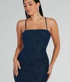 Dazzle at your next event with the glitzy Daisia Strappy Back Mermaid Glitter Formal Dress, a stunning navy glitter dress featuring sparkling details ideal for holiday parties or formal gatherings from galas to Winter Formal dances.