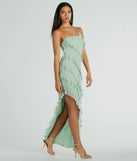 Turn heads at Prom 2025 in this sage green prom dress, where statement-making details meet the iconic style of the Jaymie One-Shoulder Ruffle Slit Formal Dress .