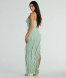 Revamp your 2025 wardrobe with this chic addition, the Jaymie One-Shoulder Ruffle Slit Formal Dress in sage green, perfect for elevating your style in the new year.