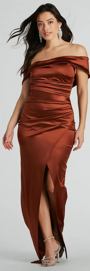 Turn heads at Prom 2025 in this brown prom dress, where statement-making details meet the iconic style of the Maeva Formal Satin Off-The-Shoulder Dress .