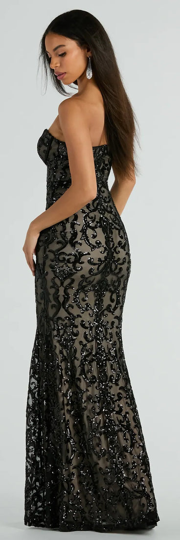 The Serena Strapless Corset Sequin Column Formal Dress is a show-stopping black prom dress, offering a sleek, slimming silhouette that enhances your natural beauty for an unforgettable night.