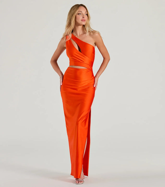 Turn heads at Prom 2025 in this orange prom dress, where statement-making details meet the iconic style of the Avery One Shoulder Cutout Slim Formal Dress .