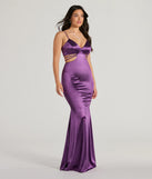 The Pricilla V-Neck Strappy Mermaid Satin Formal Dress is an elegant purple formal dress in a rich seasonal color and with unique design accents that make dressing up for winter parties, holiday balls, or festive gatherings effortless!