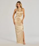 Turn heads at Prom 2025 in this gold prom dress, where statement-making details meet the iconic style of the Melina Halter Slim Long Satin Formal Dress .