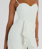 Make a bold statement in the Darcie Sweetheart Ruffle Slim Crepe Formal Dress in white, the perfect spring dress for weddings, cocktail hours, nights out, and/or seasonal celebrations.