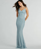 Turn heads at HOCO 2025 in this light blue homecoming dress, where statement-making details meet the iconic style of the Elowyn Ruffle-Back Glitter Mesh Mermaid Dress.