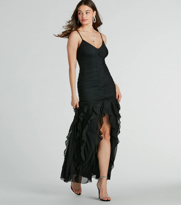 The Keily Ruched And Ruffled Mesh Formal Dress is an elegant black formal dress in a rich seasonal color and with unique design accents that make dressing up for winter parties, holiday balls, or festive gatherings effortless!