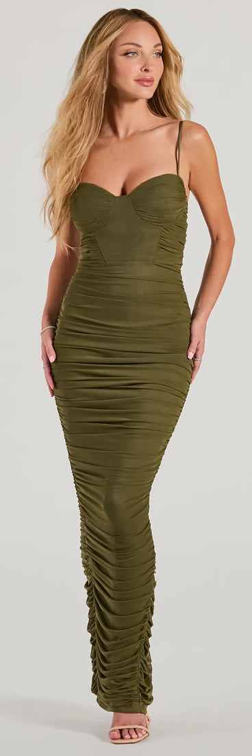 Turn heads at Prom 2025 in this olive green prom dress, where statement-making details meet the iconic style of the Maria Sweetheart Ruched Slim Mesh Formal Dress .