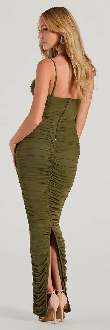 The Maria Sweetheart Ruched Slim Mesh Formal Dress in olive is a stunning green prom dress designed to capture attention with its fresh or bold color and effortlessly stylish silhouette.