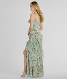 The Helga V-Neck Ruffled Mermaid Floral Formal Dress is a stylish sage floral dress featuring a fresh seasonal print and flattering design, perfect for garden parties, bridal showers, graduation photoshoots, or everyday spring styling.