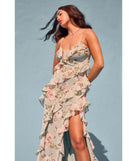 The Helga V-Neck Ruffled Mermaid Floral Formal Dress in sage is a stunning green prom dress designed to capture attention with its fresh or bold color and effortlessly stylish silhouette.