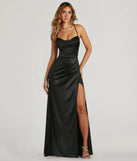 Turn heads at Prom 2025 in this black prom dress, where statement-making details meet the iconic style of the Melinda Formal Satin Lace-Up Column Dress .