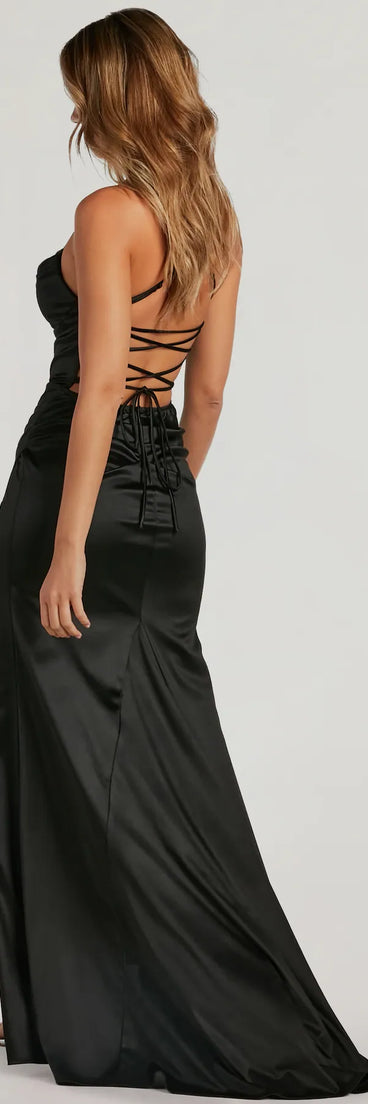 The Melinda Satin Lace-Up Formal Dress is a show-stopping black homecoming dress, offering a sleek, slimming silhouette that enhances your natural beauty for an unforgettable night.