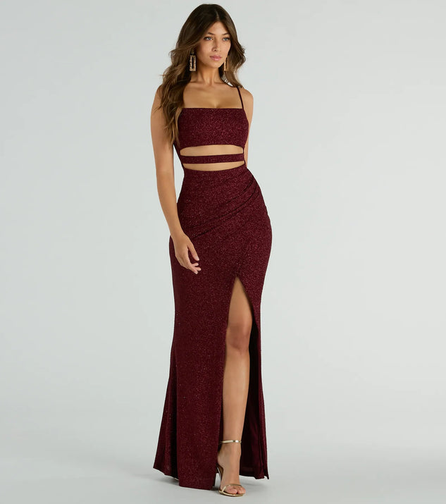Turn heads at Prom 2025 in this wine prom dress, where statement-making details meet the iconic style of the Candice Cutout Strappy Mermaid Glitter Formal Dress .