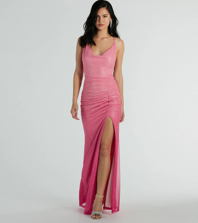 Turn heads at Prom 2025 in this pink prom dress, where statement-making details meet the iconic style of the Kate Strappy Back Ombre Glitter Formal Dress .