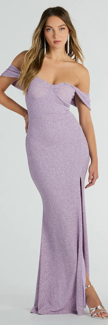 Turn heads at Prom 2025 in this lavender prom dress, where statement-making details meet the iconic style of the Tamara Off-The-Shoulder Mermaid Glitter Formal Dress .