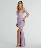 You'll be the best dressed in the Tamara Off-The-Shoulder Mermaid Glitter Formal Dress as your summer formal dress with unique details from Windsor.