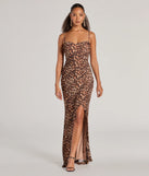 Turn heads at Prom 2025 in this brown prom dress, where statement-making details meet the iconic style of the Velma Leopard Wrap Slit Mermaid Formal Dress .
