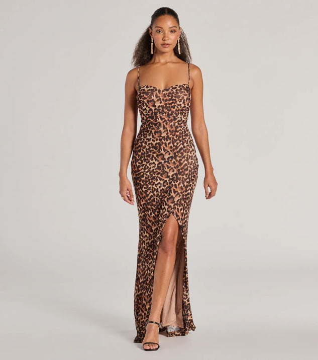 Turn heads at Prom 2025 in this brown prom dress, where statement-making details meet the iconic style of the Velma Leopard Wrap Slit Mermaid Formal Dress .