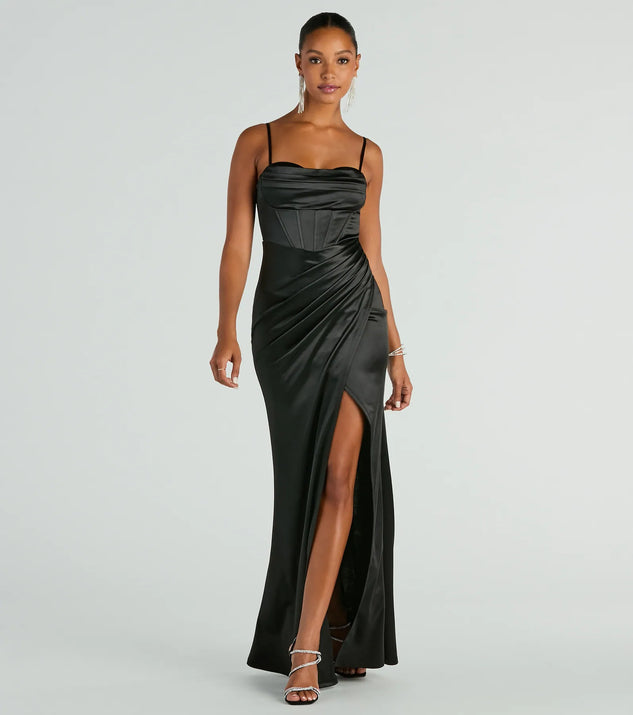 Turn heads at Prom 2025 in this black prom dress, where statement-making details meet the iconic style of the Stacie Formal Satin Corset Bodycon Dress .