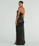 The Stacie Satin Corset Wrap Formal Dress is a show-stopping black prom dress, offering a sleek, slimming silhouette that enhances your natural beauty for an unforgettable night.