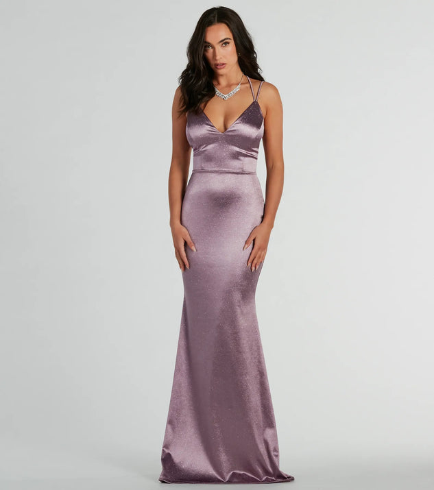 You'll be the best dressed in the Melanie Sleeveless Lace-Up Glitter Satin Formal Dress as your summer formal dress with unique details from Windsor.