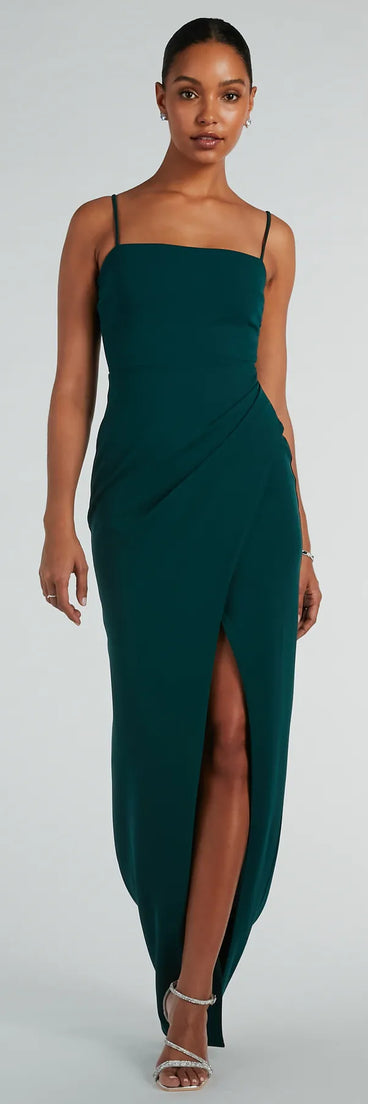 Turn heads at Prom 2025 in this hunter green prom dress, where statement-making details meet the iconic style of the Christie Sleeveless Slim Crepe Formal Dress .