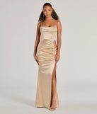 Turn heads at Prom 2025 in this taupe prom dress, where statement-making details meet the iconic style of the Jazmine Cowl Neck Slit A-Line Satin Formal Dress .