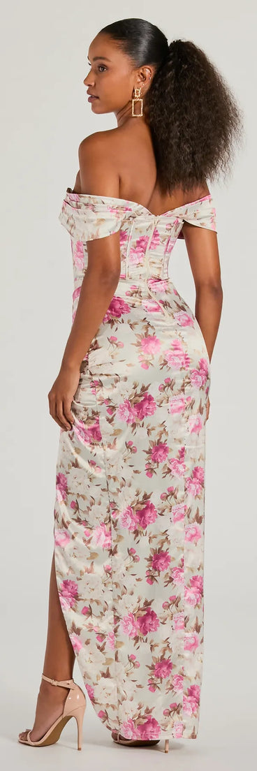 The Mildred Off-The-Shoulder Floral Satin Formal Dress is a stylish taupe floral dress featuring a fresh seasonal print and flattering design, perfect for garden parties, bridal showers, graduation photoshoots, or everyday spring styling.