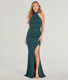 Turn heads at Prom 2025 in this hunter green prom dress, where statement-making details meet the iconic style of the Nayeli Halter Slit Mermaid Glitter Formal Dress .
