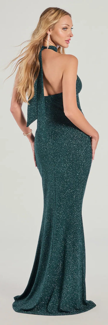 The Nayeli Halter Slit Mermaid Glitter Formal Dress in hunter is a stunning green prom dress designed to capture attention with its fresh or bold color and effortlessly stylish silhouette.