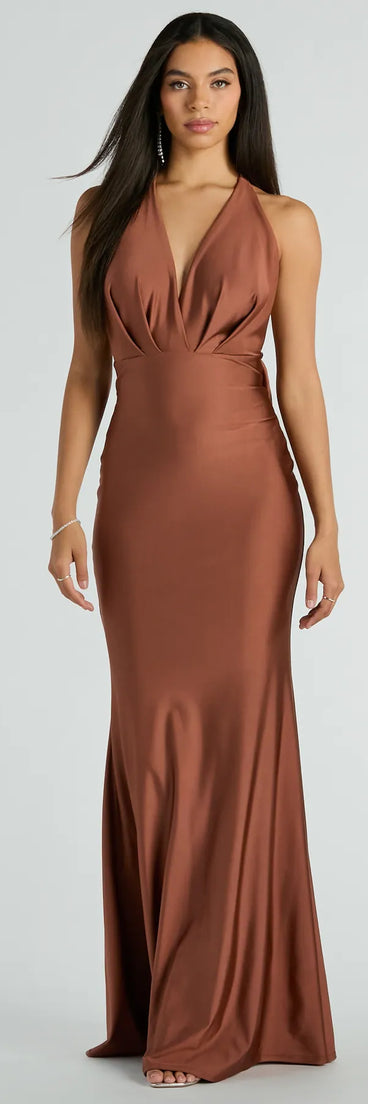 Turn heads at Prom 2025 in this brown prom dress, where statement-making details meet the iconic style of the Dallas V-Neck Halter Open Back Mermaid Formal Dress .
