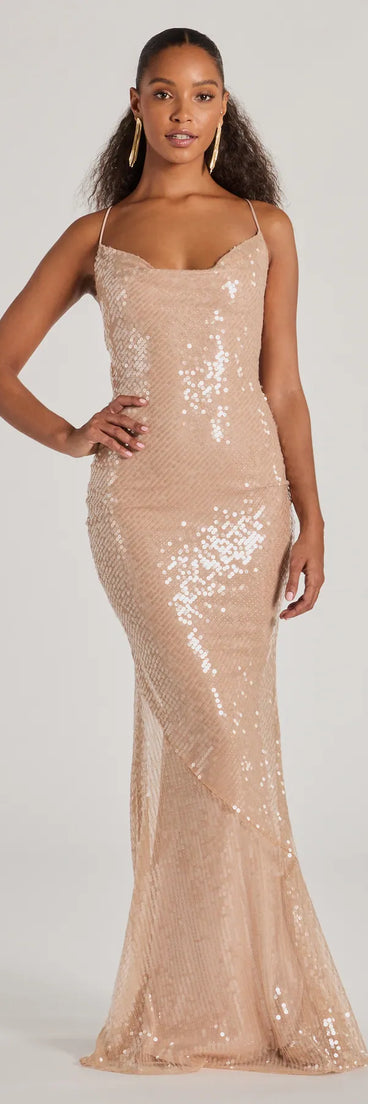 Turn heads in the beaming Rachael Lace Up Mermaid Sequin Formal Dress, a stunning nude sequin dress designed to add sparkle and elegance to your next night out or special occasion.