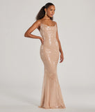 Shine bright in the Rachael Lace Up Mermaid Sequin Formal Dress, a glamorous nude sequin dress that captures the light beautifully, ideal for an NYE party dress, wedding guest dress, or military ball gown.