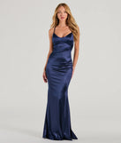 Turn heads at Prom 2025 in this navy blue prom dress, where statement-making details meet the iconic style of the Emmie Lace-Up Mermaid Satin Formal Dress .