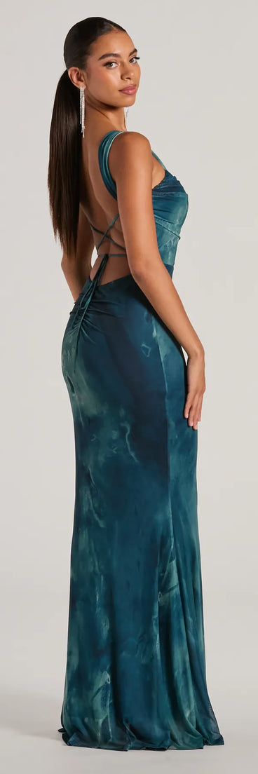 The Estelle Lace-Up Abstract Mermaid Formal Dress in teal is a stunning green prom dress designed to capture attention with its fresh or bold color and effortlessly stylish silhouette.