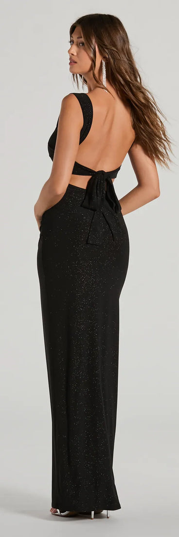 You'll be the best dressed in the Annie Tie Back Wrap Slit Mermaid Glitter Formal Dress as your fall formal dress with beautiful and unique details from Windsor.
