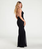 The Sam Strappy Open Back Glitter Mermaid Dress is a show-stopping black prom dress, offering a sleek, slimming silhouette that enhances your natural beauty for an unforgettable night.