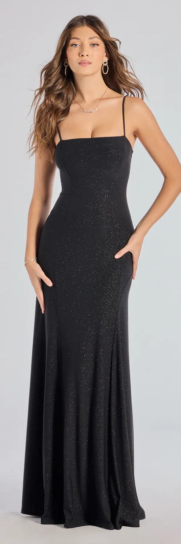 Turn heads at Prom 2025 in this black prom dress, where statement-making details meet the iconic style of the Wendy Sleeveless A-Line Glitter Formal Dress .