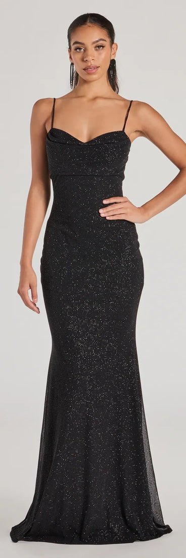 Turn heads at Prom 2025 in this black prom dress, where statement-making details meet the iconic style of the Aileen Sleeveless Glitter Mesh Mermaid Dress .